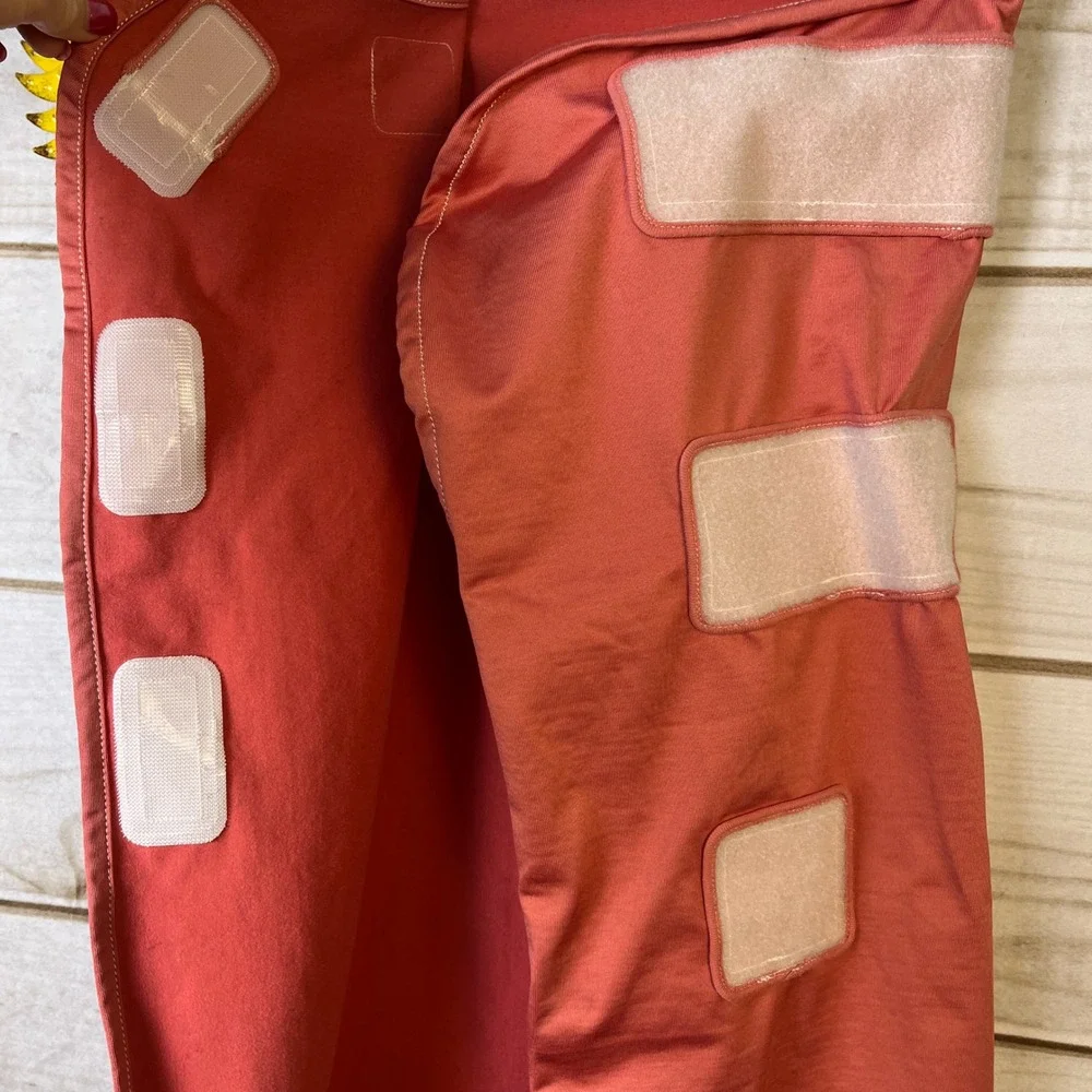 The Ollie‎ Swaddle Coral Pink Adjustable Infant Sleep Wrap